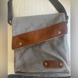 Gray canvas and leather bag/purse. Cross body